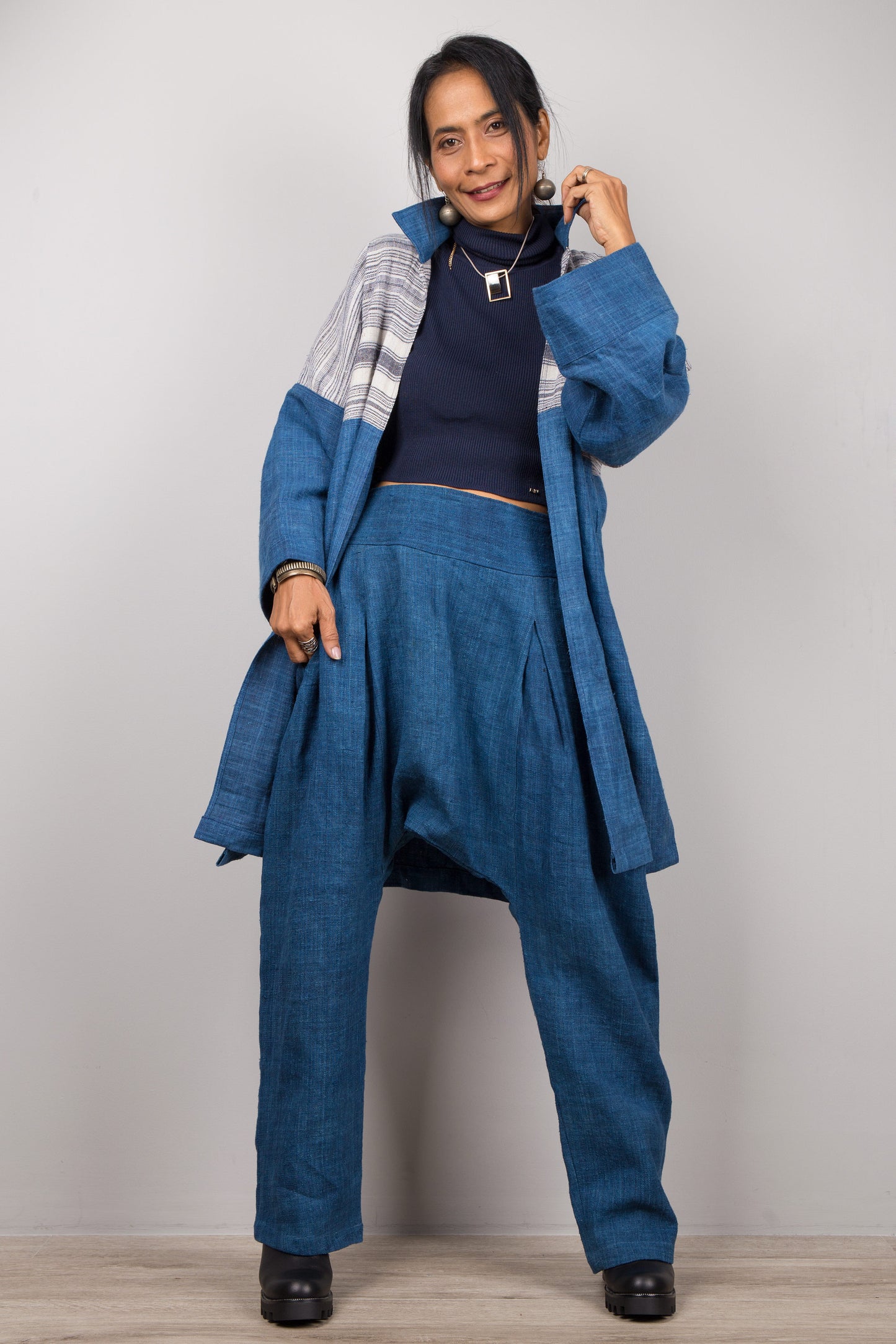 Front view of natural indigo hill tribe cardigan with open front and striped yoke, Nuichan