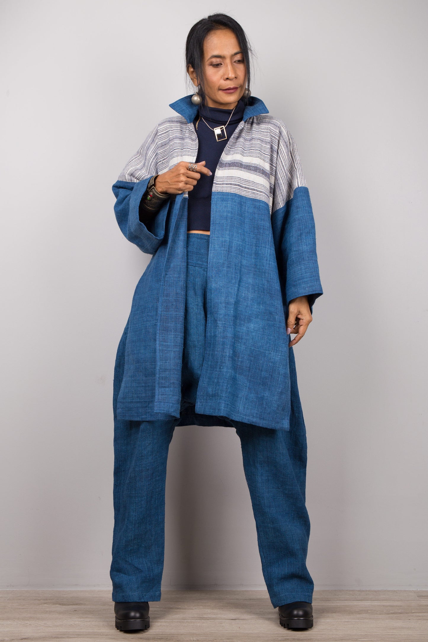 Front view of natural indigo hill tribe cardigan with split front and striped yoke, Nuichan