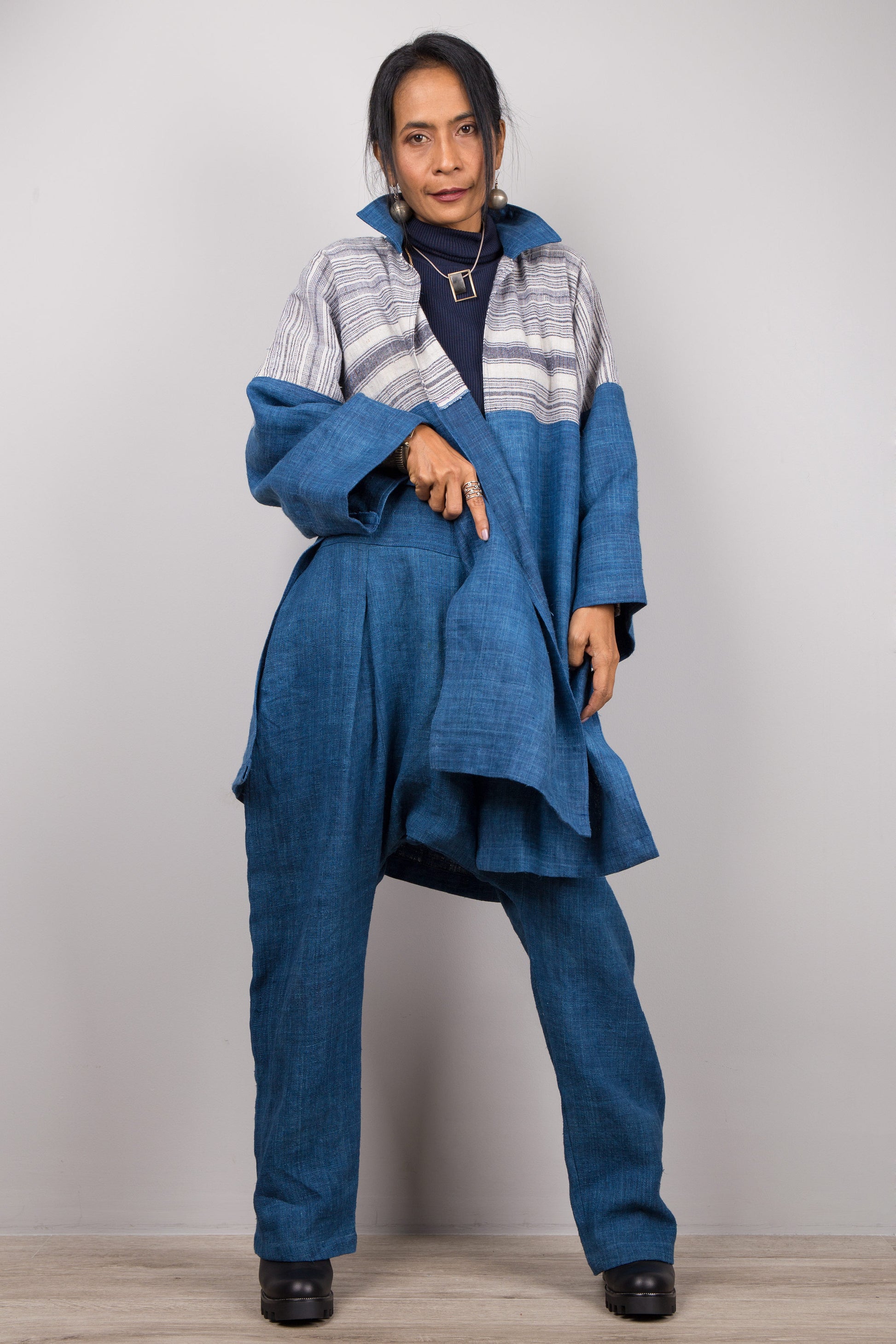 Front view of natural indigo hill tribe cardigan with split front and striped yoke, Nuichan