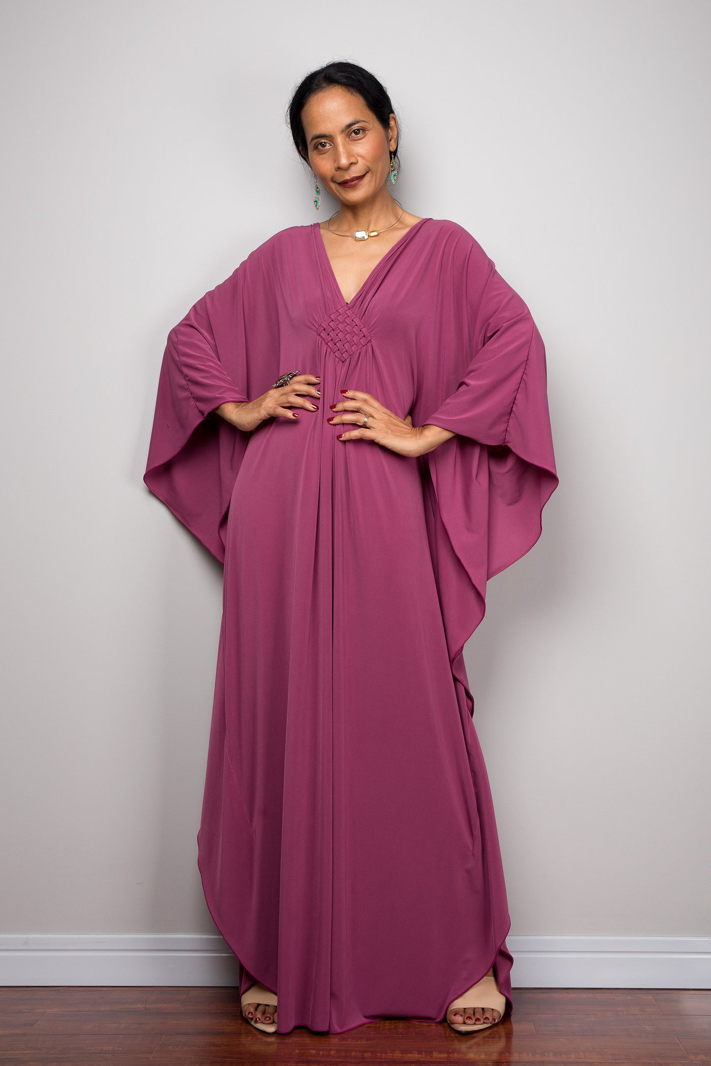 Batwing sleeve kaftan dress by Nuichan. V neck and braided chest detail