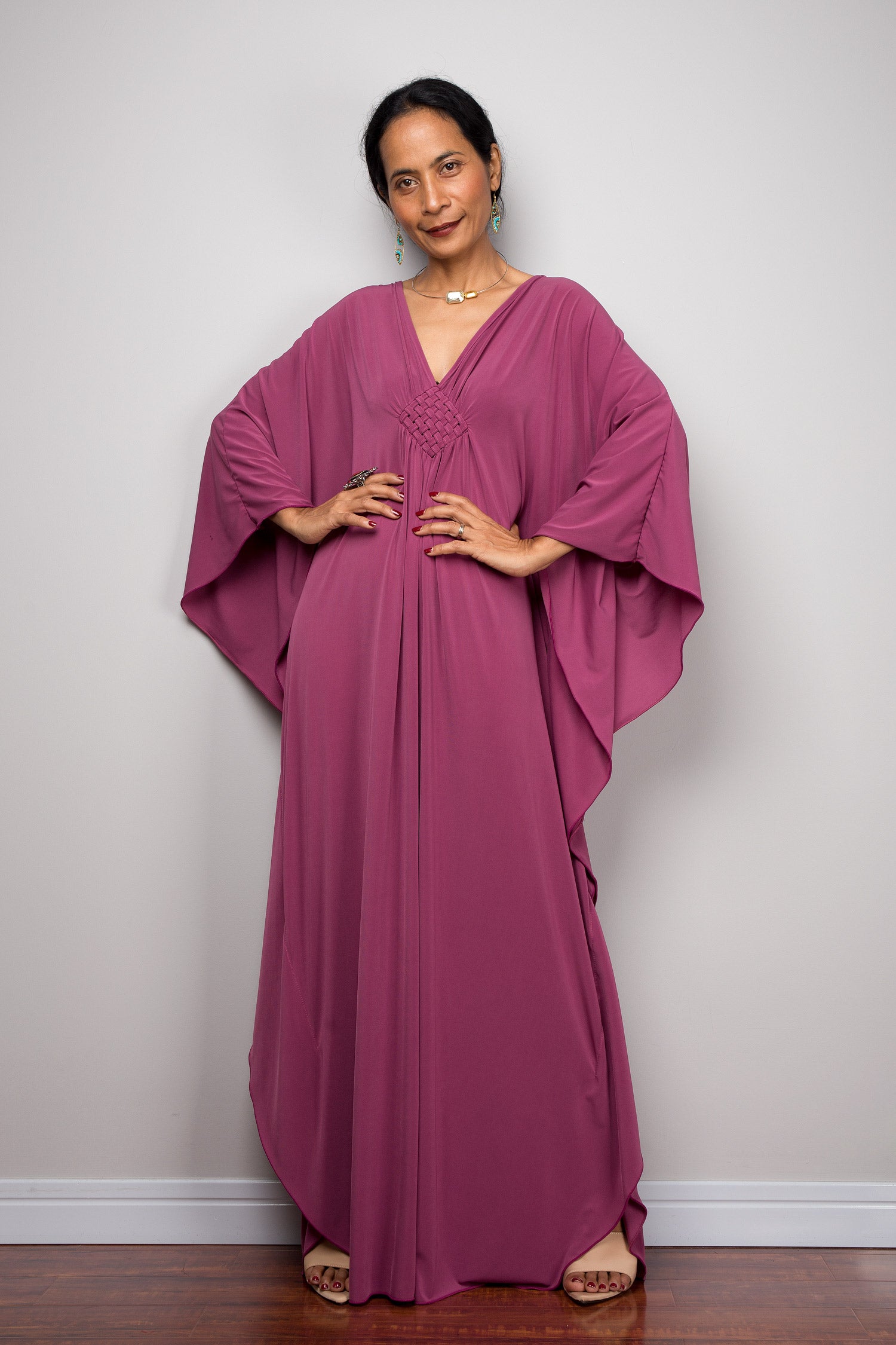 Batwing sleeve kaftan dress by Nuichan. V neck and braided chest detail