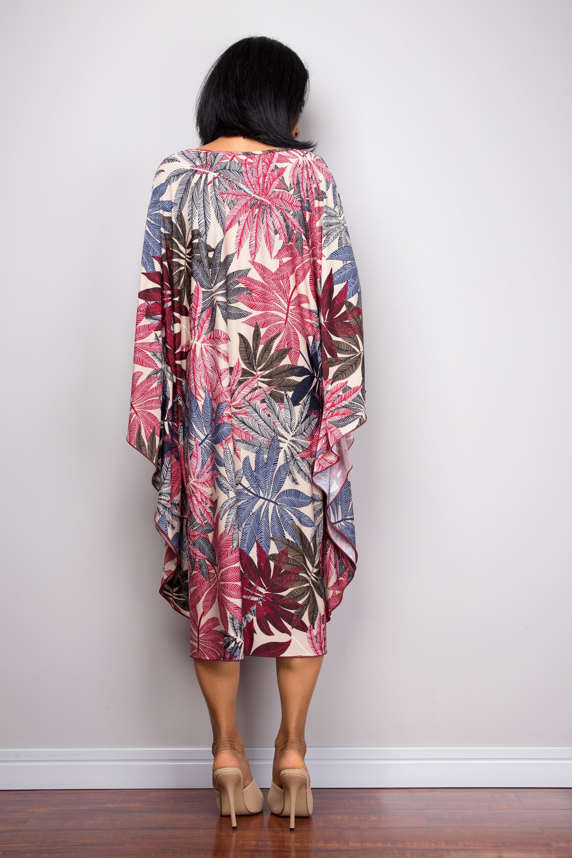 Women’s ITY midi caftan dress with tropical palm leaf print, wide sleeves, V-neck with tie, great for boho summer wardrobe. 

