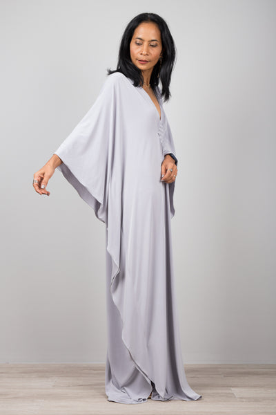 Light grey kaftan dress with plunging neckline.  Diamond shape woven detail just below neckline.  A true classic toga dress by Nuichan